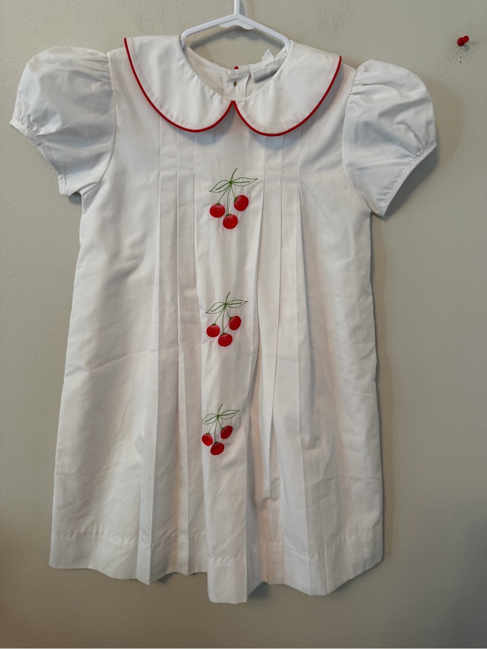 The Proper Peony Cherry Embroidered Dress with Red Trim